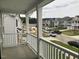 A view from the balcony showcasing the neighborhood's layout and new construction at 310 N Maple Walk # 236, Garner, NC 27529
