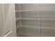 Walk in pantry with multiple wire shelves at 310 N Maple Walk # 236, Garner, NC 27529