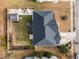 Aerial view showing house, backyard patio, shed, and playground at 5909 Clarks Fork Dr, Raleigh, NC 27616