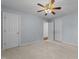 Bright bedroom with ceiling fan and carpet at 5909 Clarks Fork Dr, Raleigh, NC 27616