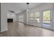 Bright dining room features hardwood floors and access to backyard at 5909 Clarks Fork Dr, Raleigh, NC 27616