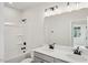 Modern bathroom with double vanity, bathtub, and shower at 600 Hillfarm Dr, Wake Forest, NC 27587