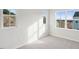 Bright bedroom with neutral carpeting and large windows at 600 Hillfarm Dr, Wake Forest, NC 27587
