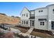 Beautiful new construction townhome with modern gray siding and a welcoming front entrance at 600 Hillfarm Dr, Wake Forest, NC 27587
