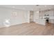 Open living space with hardwood floors and kitchen views at 600 Hillfarm Dr, Wake Forest, NC 27587