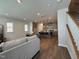 Open concept living space featuring a modern kitchen with an island and stainless steel appliances at 600 Hillfarm Dr, Wake Forest, NC 27587