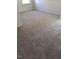Carpeted bedroom offering a bright window and a view of a door at 65 Vili Dr, Broadway, NC 27505