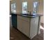 Kitchen island featuring a stainless steel sink and granite countertops at 65 Vili Dr, Broadway, NC 27505