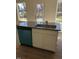 Stylish kitchen island with a granite countertop, stainless steel sink, and built-in dishwasher at 65 Vili Dr, Broadway, NC 27505