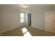 Spacious bedroom with walk-in closet and window at 68 Hampshire Ct, Four Oaks, NC 27524