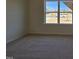 Bright bedroom with plush carpet and a large window at 87 Vili Dr, Broadway, NC 27505