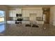Well-appointed kitchen featuring granite counters, stainless appliances, and ample cabinet space at 87 Vili Dr, Broadway, NC 27505
