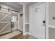 Inviting entryway with a barn door and hardwood floors at 909 E F St, Butner, NC 27509