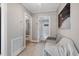 Cozy hallway with seating area and access to other rooms at 909 E F St, Butner, NC 27509
