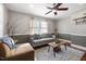 Living room with two-tone walls and hardwood floors at 909 E F St, Butner, NC 27509