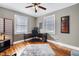 Home office with hardwood floors and window views at 909 E F St, Butner, NC 27509