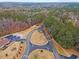 Aerial view of community entrance and roads at 101 Prairie Dog Dr, Louisburg, NC 27549