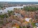 Waterfront property with lake access; aerial view at 101 Prairie Dog Dr, Louisburg, NC 27549