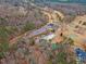 Aerial view of clubhouse and golf course at 101 Prairie Dog Dr, Louisburg, NC 27549