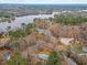 Waterfront property with lake access; aerial view at 101 Prairie Dog Dr, Louisburg, NC 27549