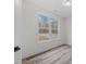 Bright bedroom with hardwood floors and a large window offering natural light at 101 Prairie Dog Dr, Louisburg, NC 27549