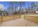 Wooden deck overlooks a wooded backyard. Perfect for relaxing outdoors at 101 Prairie Dog Dr, Louisburg, NC 27549