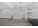 Elegant dining room with chandelier and kitchen access at 101 Prairie Dog Dr, Louisburg, NC 27549