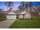 Craftsman style home with stone accents and a two-car garage at 101 Prairie Dog Dr, Louisburg, NC 27549