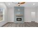 Modern linear fireplace with shiplap wall feature at 101 Prairie Dog Dr, Louisburg, NC 27549