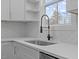 Kitchen sink with gold faucet and herringbone tile backsplash at 101 Prairie Dog Dr, Louisburg, NC 27549