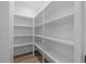 Spacious walk-in pantry with ample shelving at 101 Prairie Dog Dr, Louisburg, NC 27549