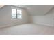 Bedroom features neutral carpet, white walls and a large window at 108 Bearwallow Forest Way, Wendell, NC 27591