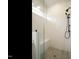 Modern shower with herringbone tile and glass enclosure at 108 Bearwallow Forest Way, Wendell, NC 27591