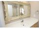 Bathroom with ornate mirror and single vanity at 109 Springwood Dr, Wake Forest, NC 27587