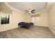 Bright bedroom with wood floors and ceiling fan at 109 Springwood Dr, Wake Forest, NC 27587