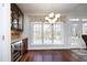 Breakfast area with built-in cabinetry and wine cooler at 109 Springwood Dr, Wake Forest, NC 27587