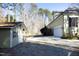 Exterior view of the house's garage and shed at 109 Springwood Dr, Wake Forest, NC 27587
