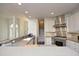 Open kitchen with stainless steel appliances and breakfast bar at 109 Springwood Dr, Wake Forest, NC 27587