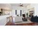 Virtually staged living room with hardwood floors and fireplace at 109 Springwood Dr, Wake Forest, NC 27587