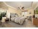 Tranquil main bedroom with tray ceiling, neutral tones, and ample natural light at 109 Springwood Dr, Wake Forest, NC 27587