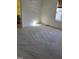 Well-lit bedroom featuring neutral walls and carpeted floors at 1235 Stone Manor Dr, Raleigh, NC 27610
