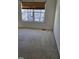 Charming bedroom with a large window offering natural light at 1235 Stone Manor Dr, Raleigh, NC 27610