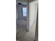 Hallway view of two bedrooms with carpeted floors at 1235 Stone Manor Dr, Raleigh, NC 27610