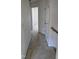 Hallway with carpet and access to bedrooms at 1235 Stone Manor Dr, Raleigh, NC 27610