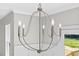 Modern, five-light brushed nickel chandelier at 1240 Dover St # 57, Roxboro, NC 27573