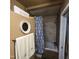 Bathroom with shower and tub combination and decorative shower curtain and matching monogrammed towels at 1309 Eastern Avenue Ave, Rocky Mount, NC 27801