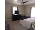 Neutral toned bedroom featuring ceiling fan, television, and matching furniture set at 1309 Eastern Avenue Ave, Rocky Mount, NC 27801