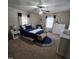 Relaxing bedroom with neutral walls and a navy blue accent for a comfortable retreat at 1309 Eastern Avenue Ave, Rocky Mount, NC 27801