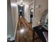 Long hallway with hardwood floors, leading to various rooms in the house at 1309 Eastern Avenue Ave, Rocky Mount, NC 27801