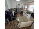 Functional kitchen with white cabinets, stainless steel appliances, granite countertops, and a breakfast bar at 1309 Eastern Avenue Ave, Rocky Mount, NC 27801